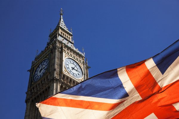 brexit concept – double exposure of flag and Westminster Palace with Big Ben
